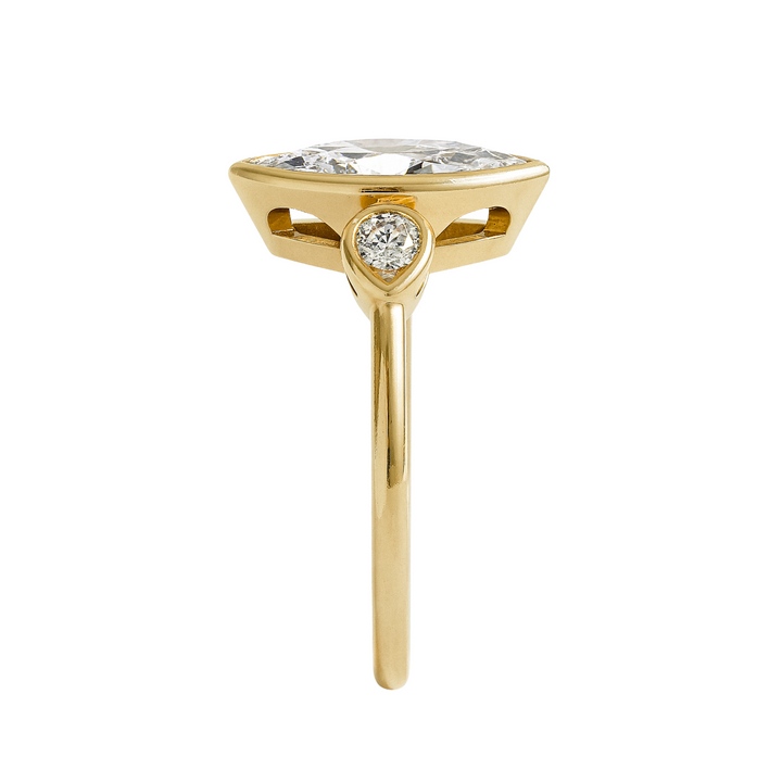 Side View of Marquise Lab Diamond Engagement Ring with Pear Accents Bezel Set 3 Stone Design in Yellow Gold | Rare Earth Jewelry