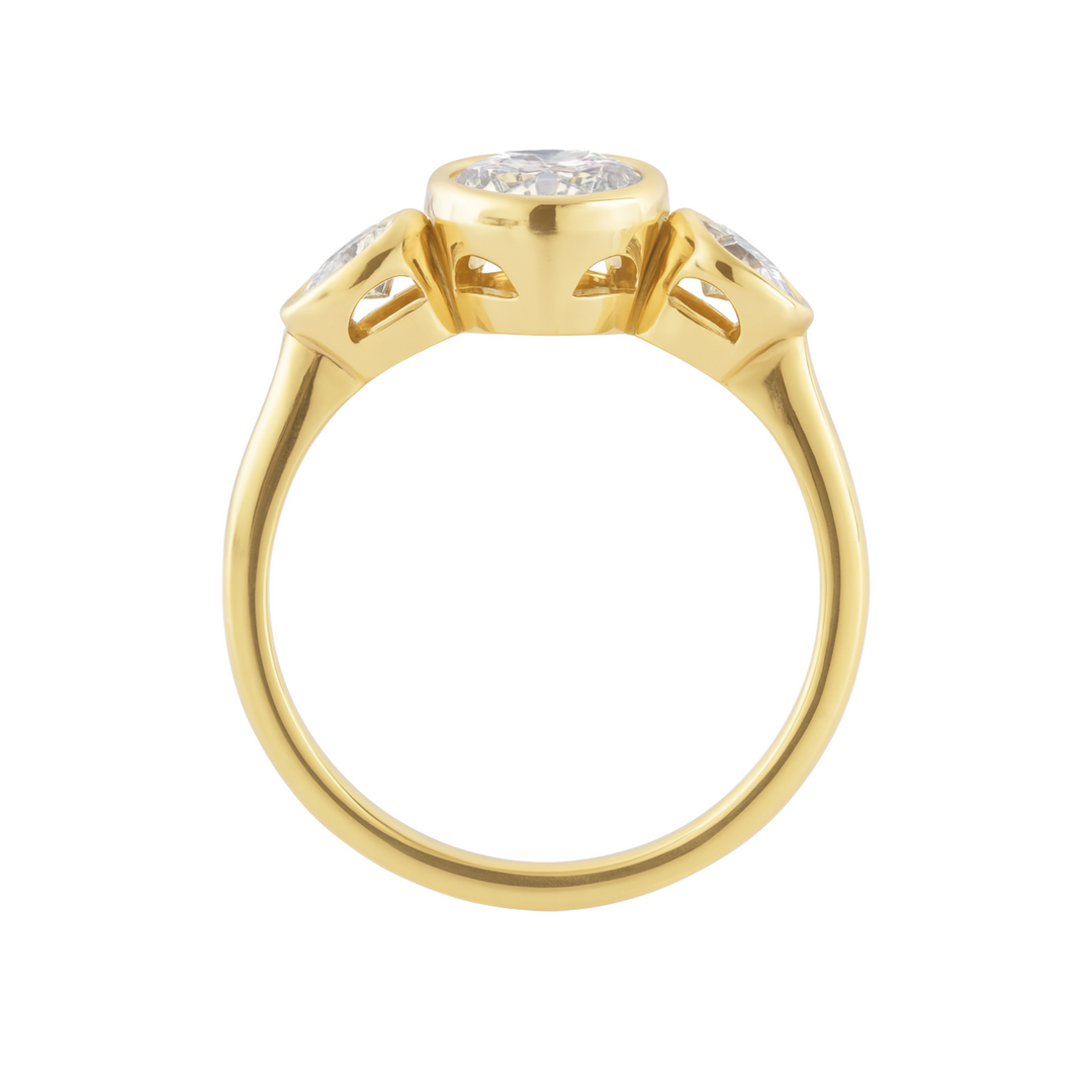 Profile View of Marquise Lab Diamond Engagement Ring with Pear Accents and Bezel Setting in Yellow Gold | Rare Earth Jewelry