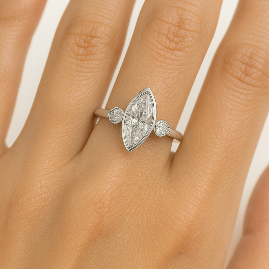 1.5 Carat Marquise Cut Lab Diamond Engagement Ring with Pear Accents on Hand 3 Stone Bezel Set in White Gold | Rare Earth Jewelry