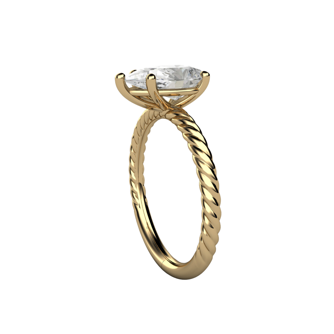 Lab Grown Pear Cut Diamond Engagement Ring showing the twisted rope-style band in Yellow Gold