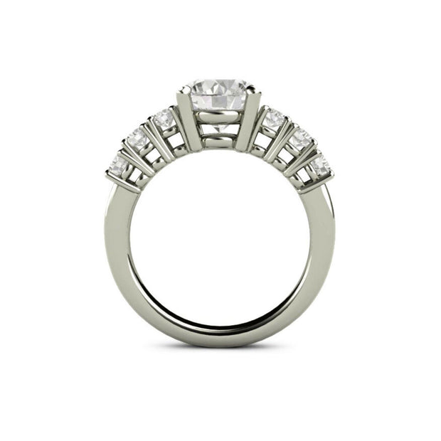 2 carat round solitaire engagement ring setting with 6 accent stones, three on each side in a classic basket setting..