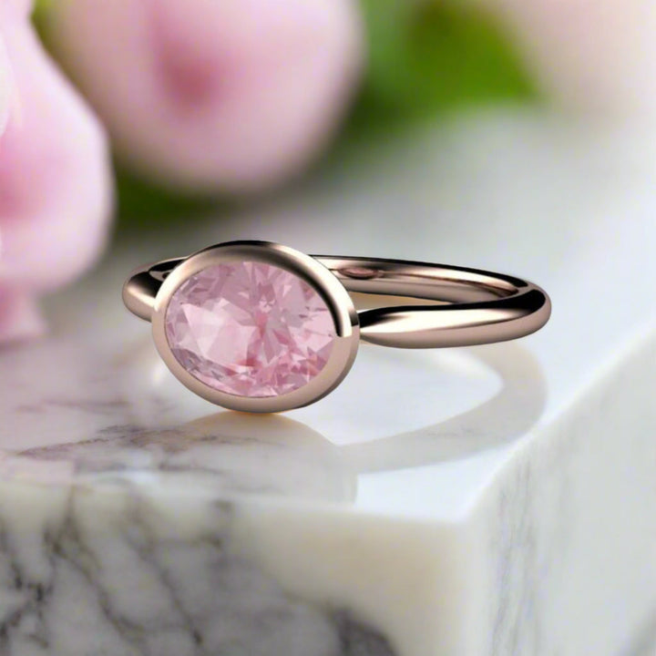 Light Pink Sapphire Engagement Ring, Oval Bezel Set Solitaire, East West Minimalist Design | Rare Earth Jewelry