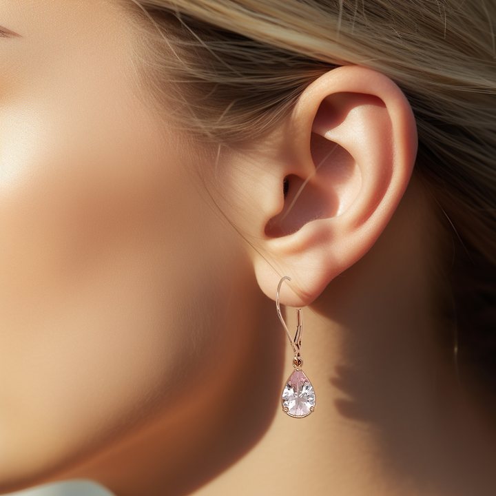 Pear Cut Morganite Dangle Earrings shown on the Ear, Natural Peach Pink Gemstone Earrings for the Bride in 14K Rose Gold, Gift for the Bride | Rare Earth Jewelry