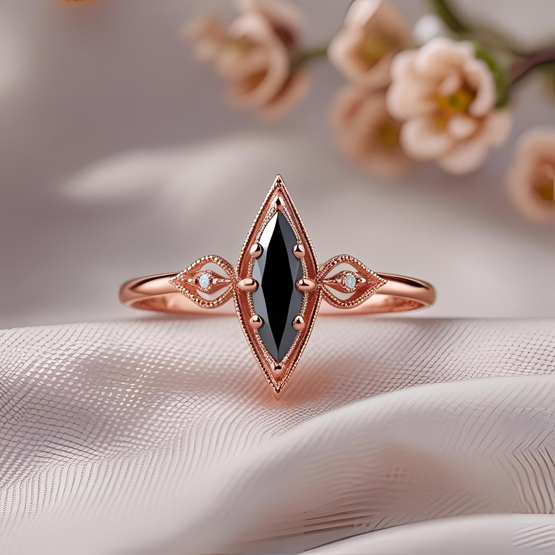 Elongated black diamond marquise ring with openwork accents, delicate lace-like effect, eight-prong setting, and romantic vintage style. Victorian Inspired Jewelry | Gothic Style Engagement Rings | Rare Earth Jewelry