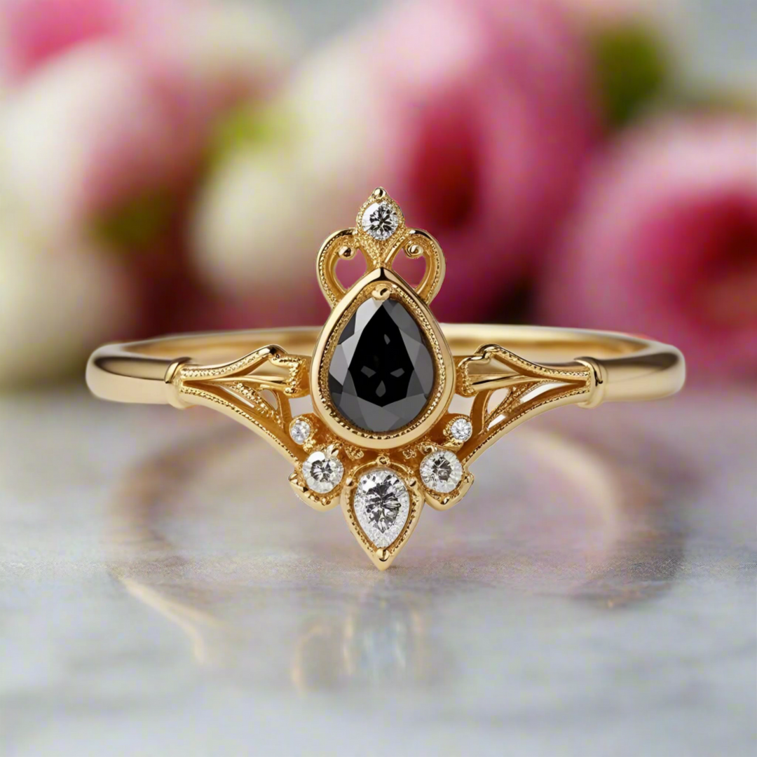 Edwardian style pear cut black diamond ring with vintage milgrain detailing and delicate crown design with diamond accents | Unique Vintage Engagement Rings | Rare Earth Jewelry