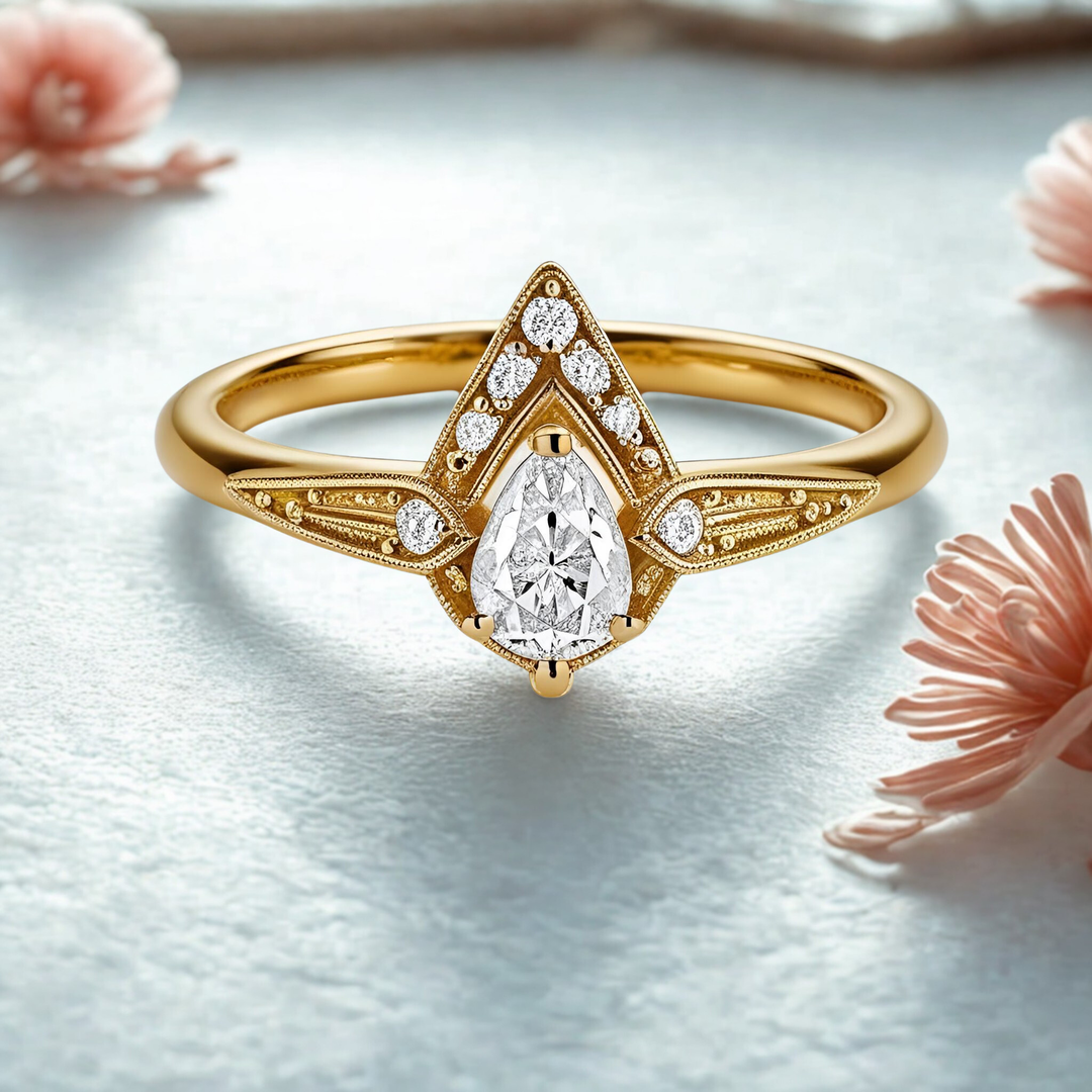 Edwardian Style Pear Cut Diamond Ring with Chevron Design, Vintage Milgrain Detailing, and Dainty Gold Setting. Unique Antique Style Engagement Rings | Rare Earth Jewelry