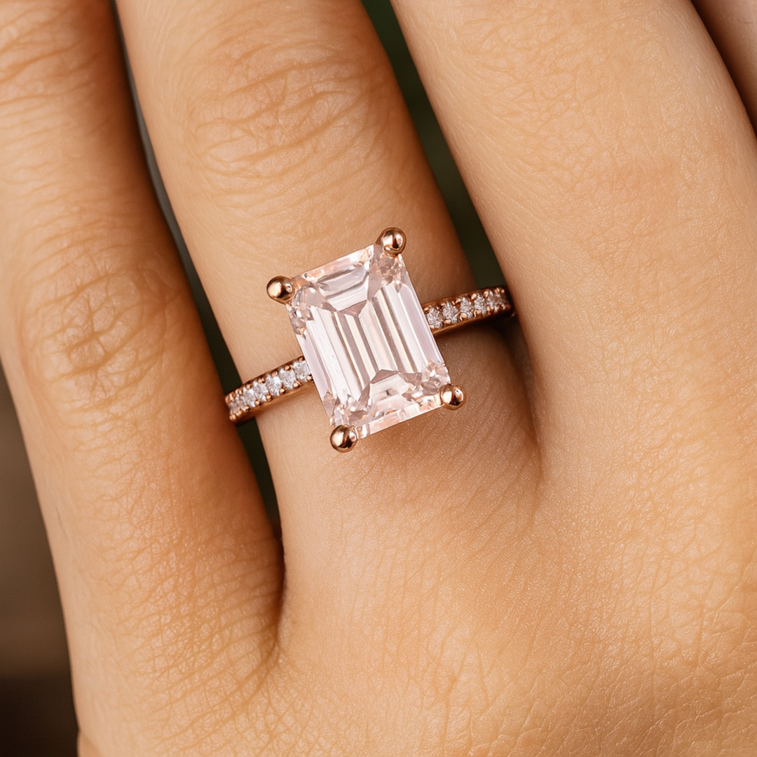 Emerald Cut Morganite Engagement Ring with Diamond Accents shown on the Hand, Morganite Solitaire Ring in Rose Gold | Rare Earth Jewelry