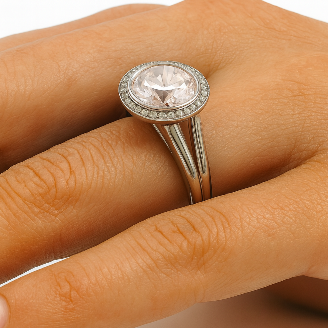 Round Morganite Engagement Ring close up on the Finger showing split shank and diamond halo | Rare Earth Jewelry