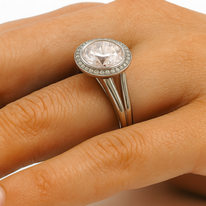 Round Morganite Engagement Ring close up on the Finger showing split shank and diamond halo | Rare Earth Jewelry