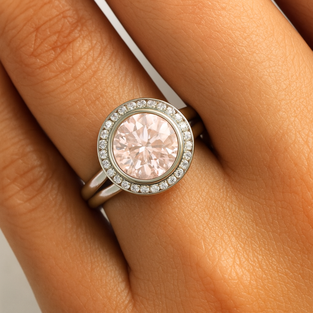 Morganite and Diamond Engagement ring on the hand, Close up Morganite Diamond Halo Ring | Rare Earth Jewelry