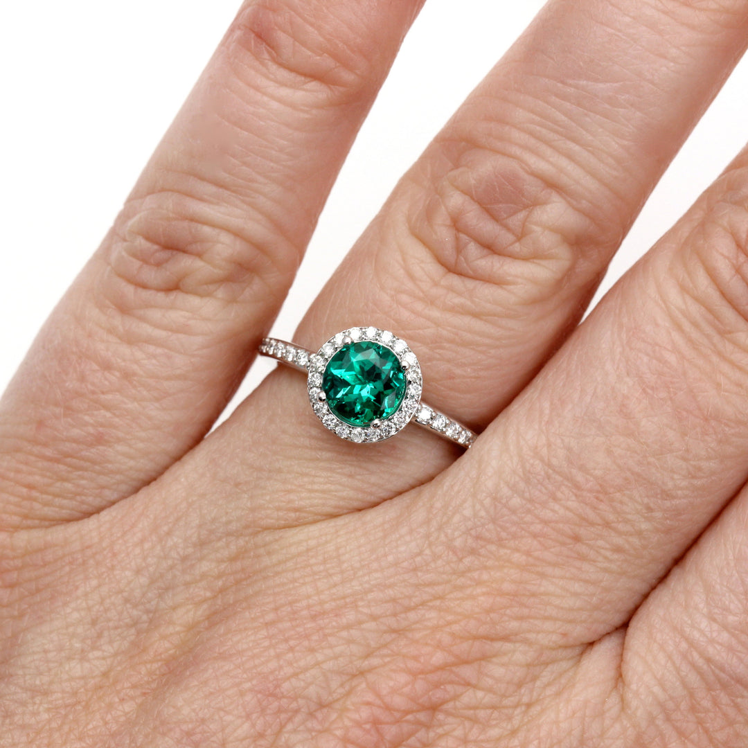 Round Emerald Engagement Ring with Diamond Halo shown on the Hand, Lab Grown Emerald Ring | Rare Earth Jewelry