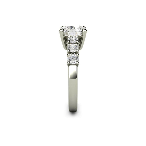 Side view of a round solitaire engagement ring.