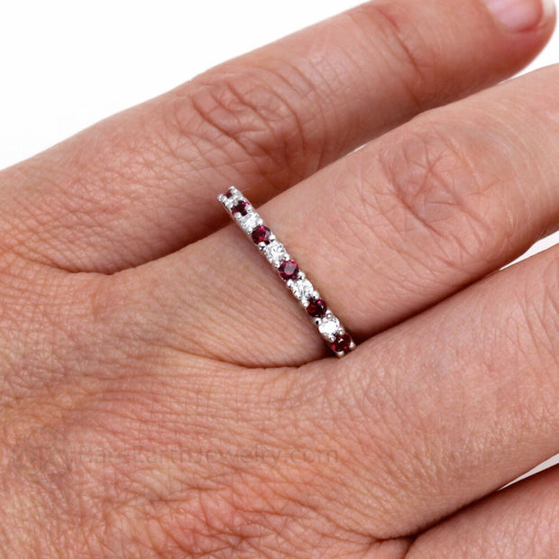 Ruby and Diamond Band on the finger.