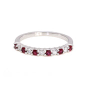 Ruby and diamond ring in white gold.  Ring celebrating a July birthday or push present.  Stacking band.