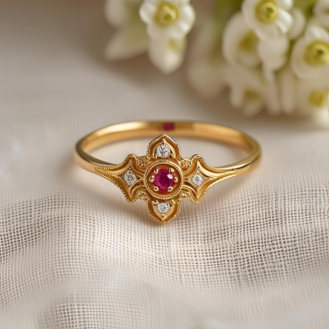 Ruby ring with vintage fleur-de-lis inspired detailing, delicate diamond accents, milgrain edges, and romantic Edwardian style. Unique Custom Jewelry | Rare Earth Jewelry