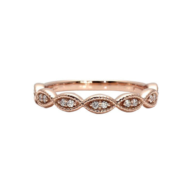 An antique style diamond wedding ring or band with a scalloped shape and milgrain beaded details.  Available in gold or platinum, shown in rose gold from Rare Earth Jewelry.