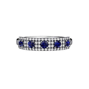A unique Art Deco style Blue Sapphire and Diamond band or wedding ring.  Round Blue Sapphires are surrounded with diamonds in a square shaped design in 14K, 18K or Platinum.  September birthstone.