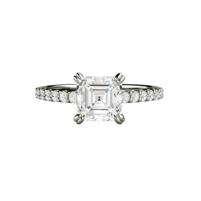 An asscher cut Moissanite engagement ring in a solitaire setting with double prongs. This Moissanite solitaire has a 1.20ct asscher cut Charles & Colvard Colorless Forever One Moissanite, an ethical and affordable lab grown diamond alternative from Rare Earth Jewelry.