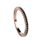 A black diamond eternity band or stacking ring in 14K, 18K Gold or Platinum, shown here in rose gold from Rare Earth Jewelry.
