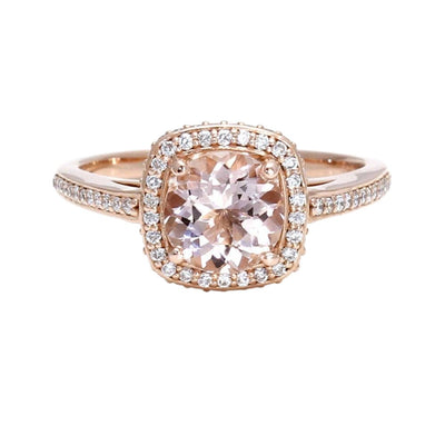 A Morganite 2ct Engagement Ring with Pave Diamond Halo and Diamond Accented Shank in a Gold or Platinum Cathedral Setting, shown in Rose Gold from Rare Earth Jewelry.