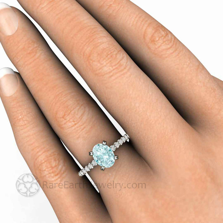 Oval Aquamarine Solitaire Engagement Ring with Pave Diamonds, Double Prong Set, Shown on the Hand