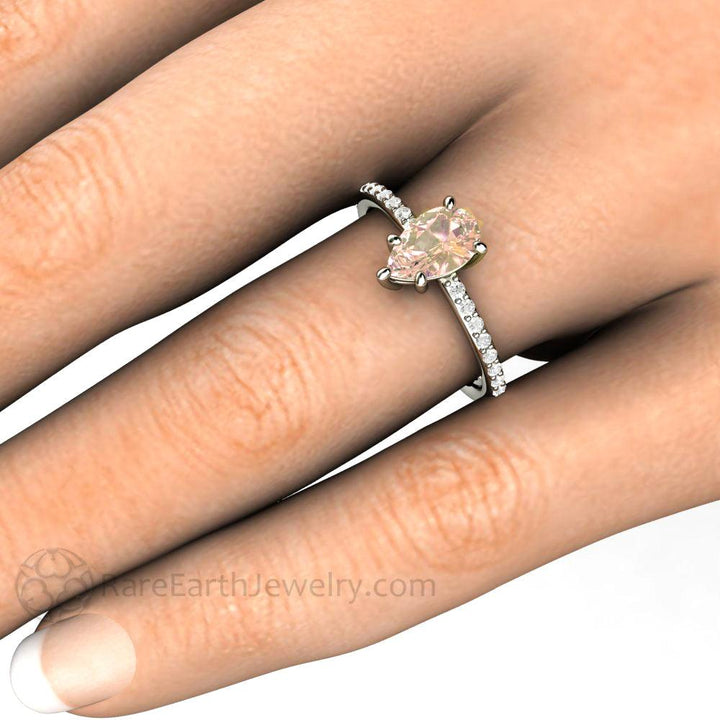 Dainty Pear Cut Pink Sapphire Engagement Ring | Light Pink Solitaire with Pavé Diamonds, Rare Earth Jewelry