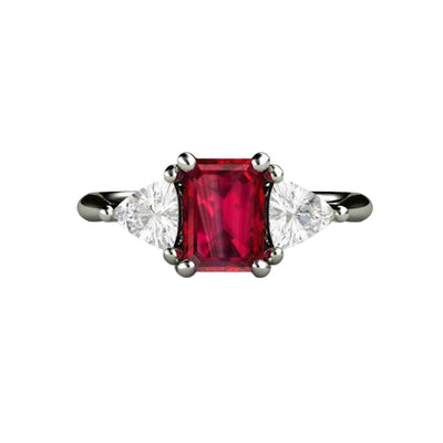 An emerald cut Ruby Engagement Ring in a 3 Stone Style with Natural White Sapphire Trillions, July Birthstone Ring in Gold or Platinum from Rare Earth Jewelry