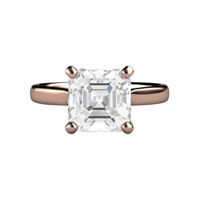 A White Sapphire engagement ring in a four prong solitaire setting in rose gold with a large asscher cut white sapphire, an affordable diamond alternative, shown in rose gold from Rare Earth Jewelry