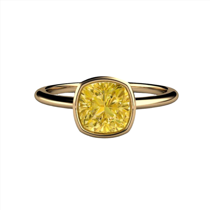 Cushion Cut Yellow Moissanite Engagement Ring, Yellow Moissanite Bezel Set Ring with Thin Band in Gold or Platinum.  Minimalist Solitaire Design from Rare Earth Jewelry