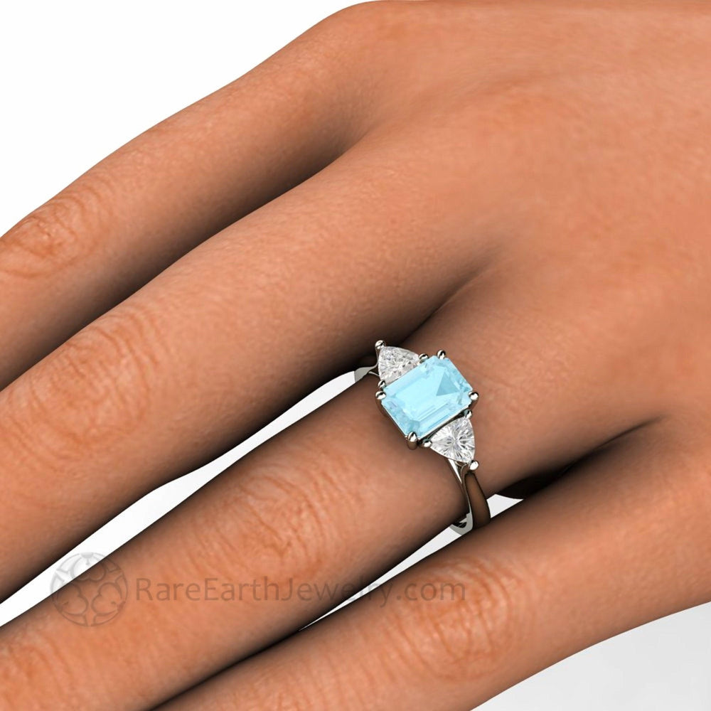 Aquamarine Engagement Ring Emerald Cut 3 Stone Style 8x6mm Emerald Cut on the Hand