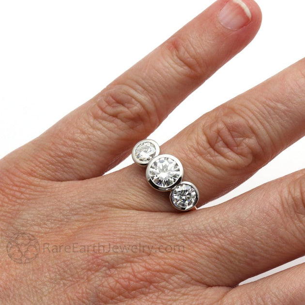 Three stone hot sale bezel ring