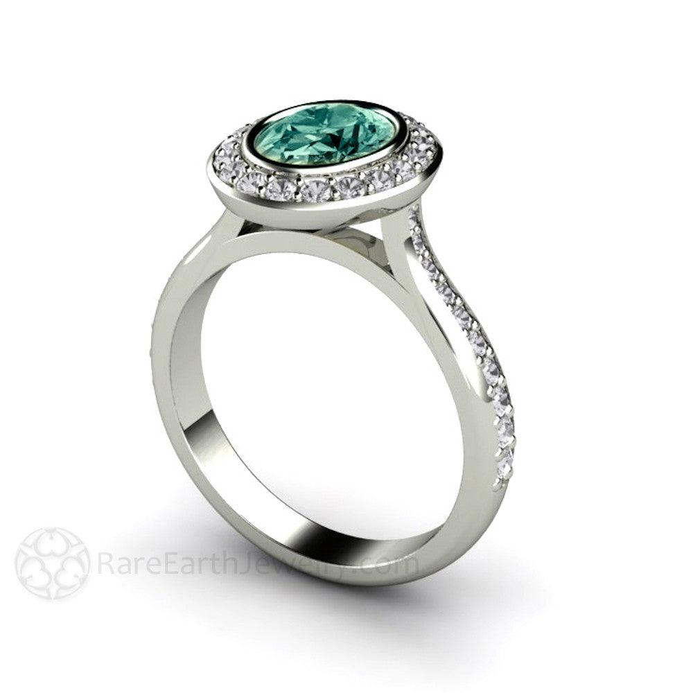 Blue Green Montana Sapphire Engagement Ring | Oval Bezel with Diamond Halo, Rare Earth Jewelry