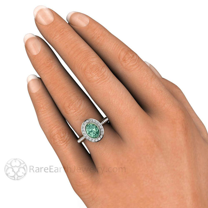 Blue Green Montana Sapphire Engagement Ring | Oval Bezel with Diamond Halo, Rare Earth Jewelry