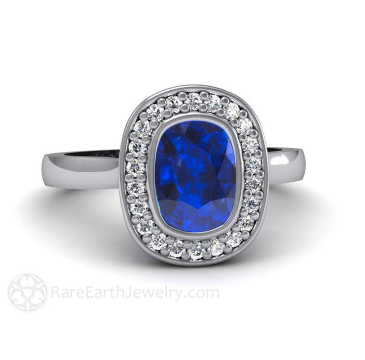 Cushion Cut Blue Sapphire Engagement Ring | Bezel Set with Diamond Halo, Rare Earth Jewelry