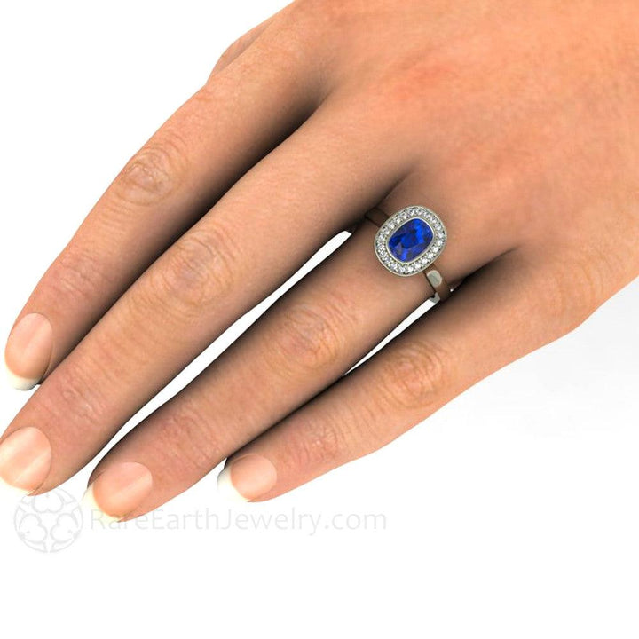 Cushion Cut Blue Sapphire Engagement Ring | Bezel Set with Diamond Halo, Rare Earth Jewelry