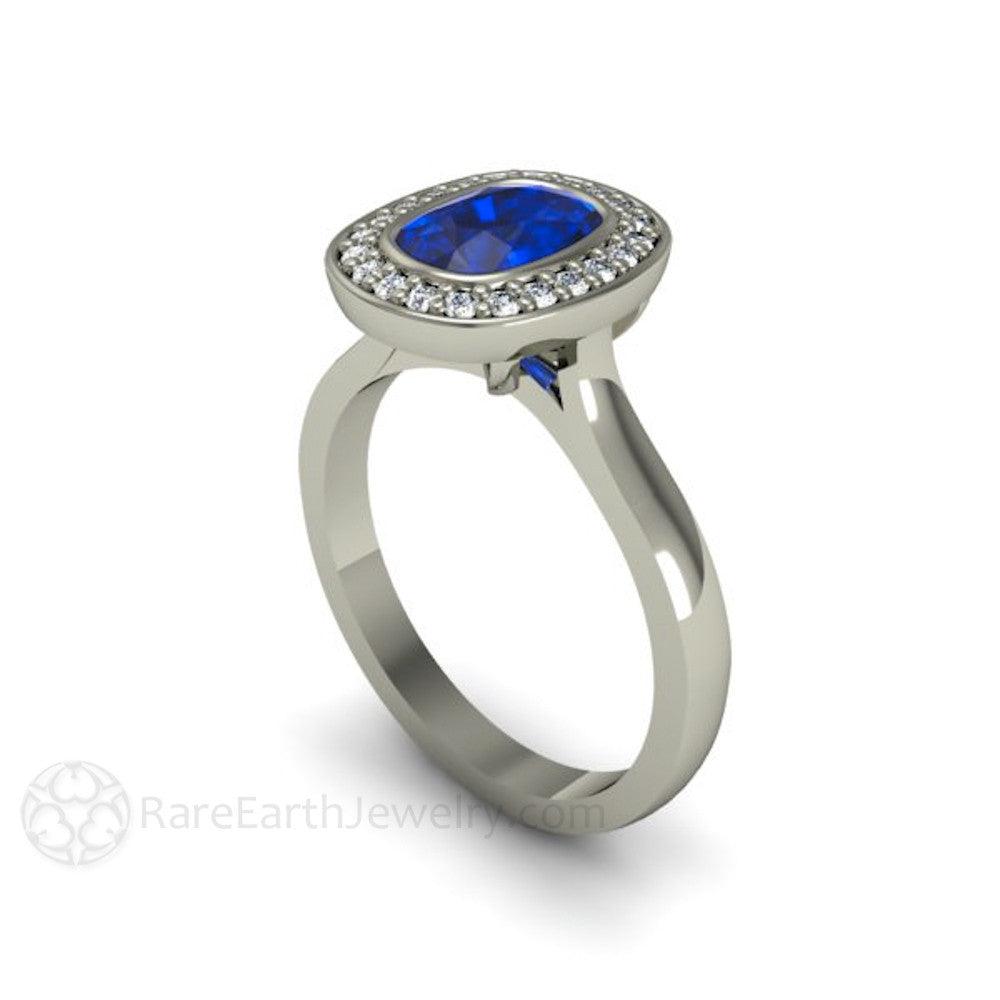 Cushion Cut Blue Sapphire Engagement Ring | Bezel Set with Diamond Halo, Rare Earth Jewelry