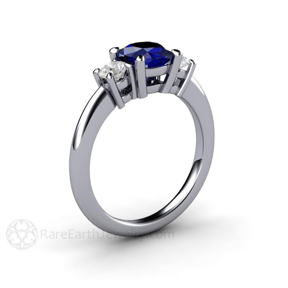 Cushion Cut Blue Sapphire Engagement Ring | 3 Stone Ring with Lab Diamond Accents, Rare Earth Jewelry