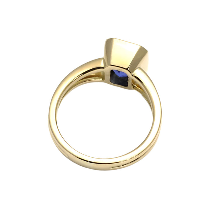 Underside of emerald cut blue sapphire engagement ring, bezel set solitaire with split shank | Rare Earth Jewelry