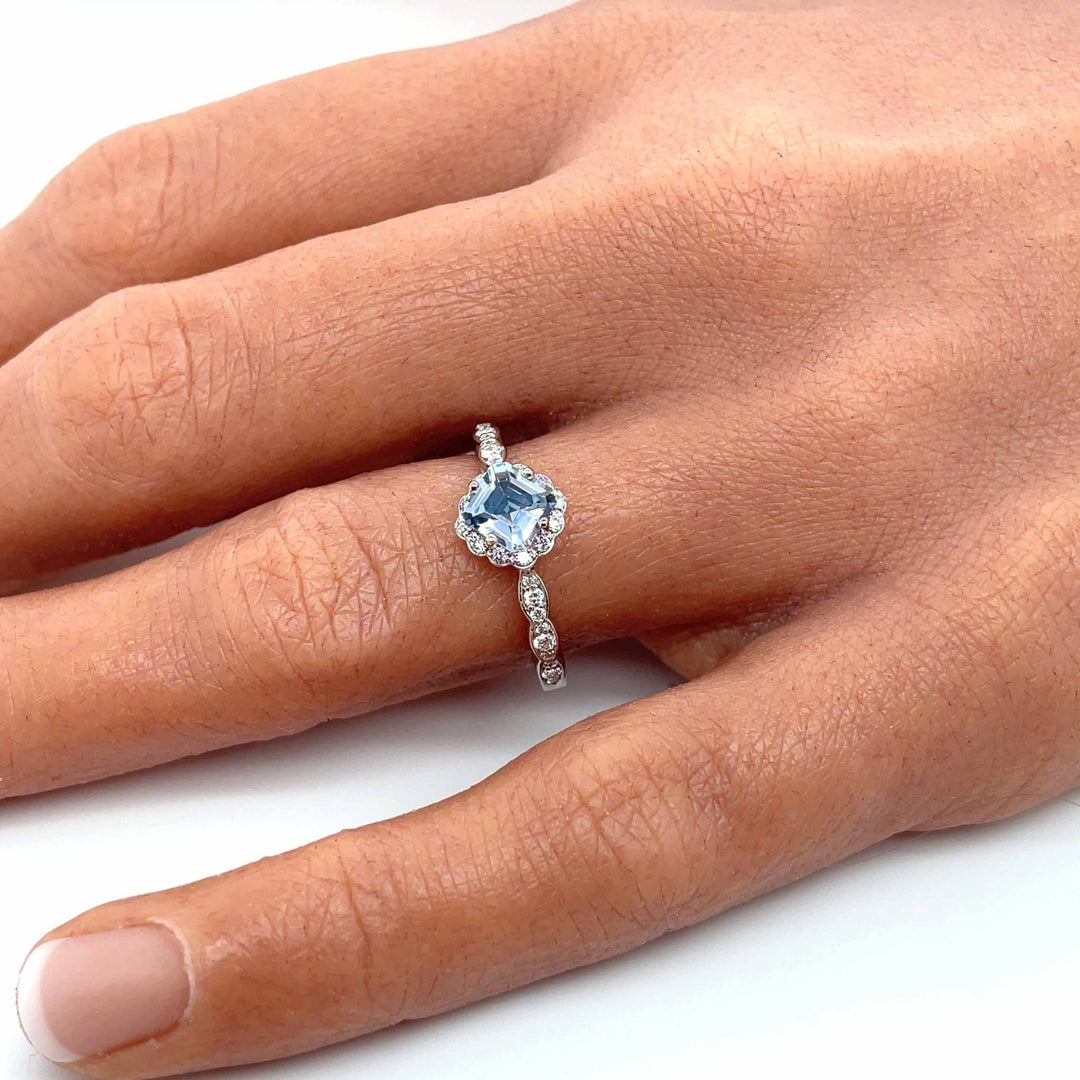 Vintage Aquamarine Engagement Ring | Asscher Cut Aquamarine Ring with Diamond Halo shown on the Hand