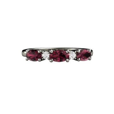 A natural Rhodolite Garnet Ring with Diamonds and Oval Cut Red Garnets set East to West, unique January birthstone anniversary band, stacking ring from Rare Earth Jewelry.