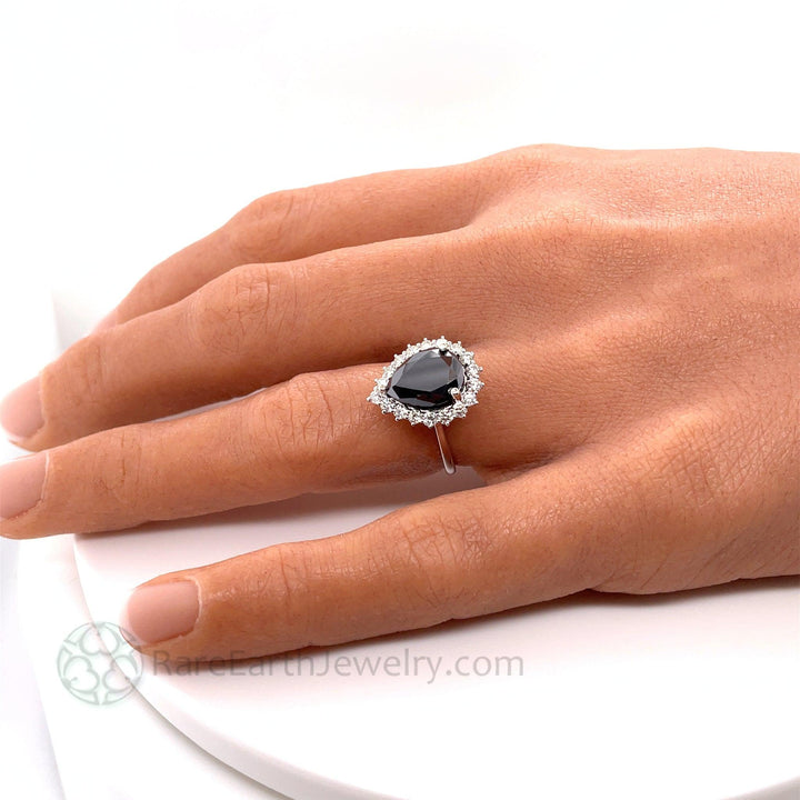 Pear Shaped Black Moissanite Engagement Ring, Large Pear Cut Diamond Halo Ring on the Finger | Rare Earth Jewelry