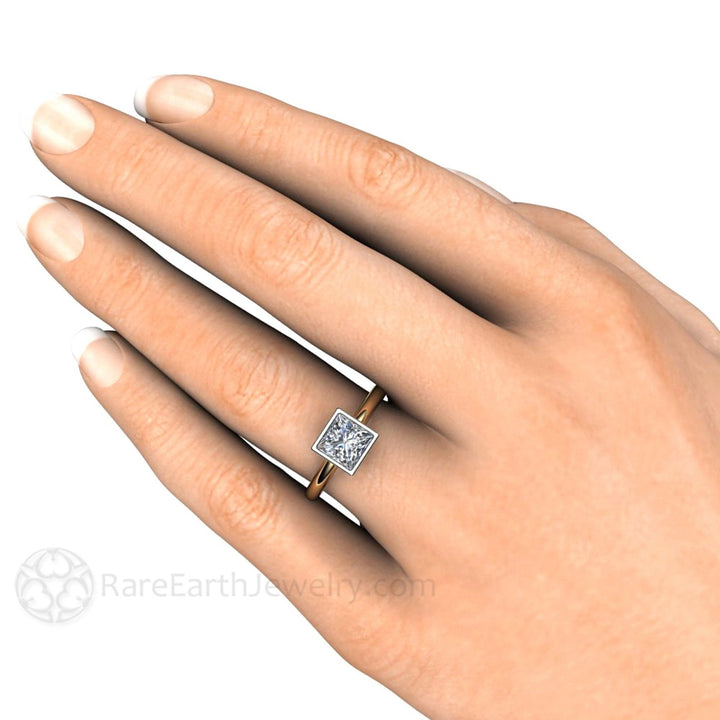 Princess Cut Moissanite Engagement Ring, Square Bezel Set Solitaire on the Hand, Minimalist Modern Design in 14K or 18K Two-Tone Gold | Rare Earth Jewelry