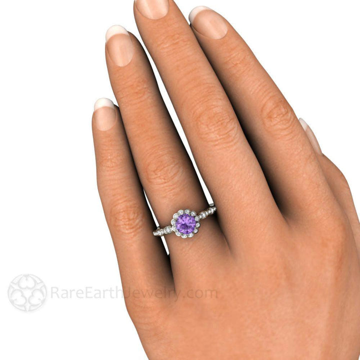 Vintage Style Purple Sapphire Engagement Ring, with Scalloped Halo and Shank shown on the Hand | Rare Earth Jewelry