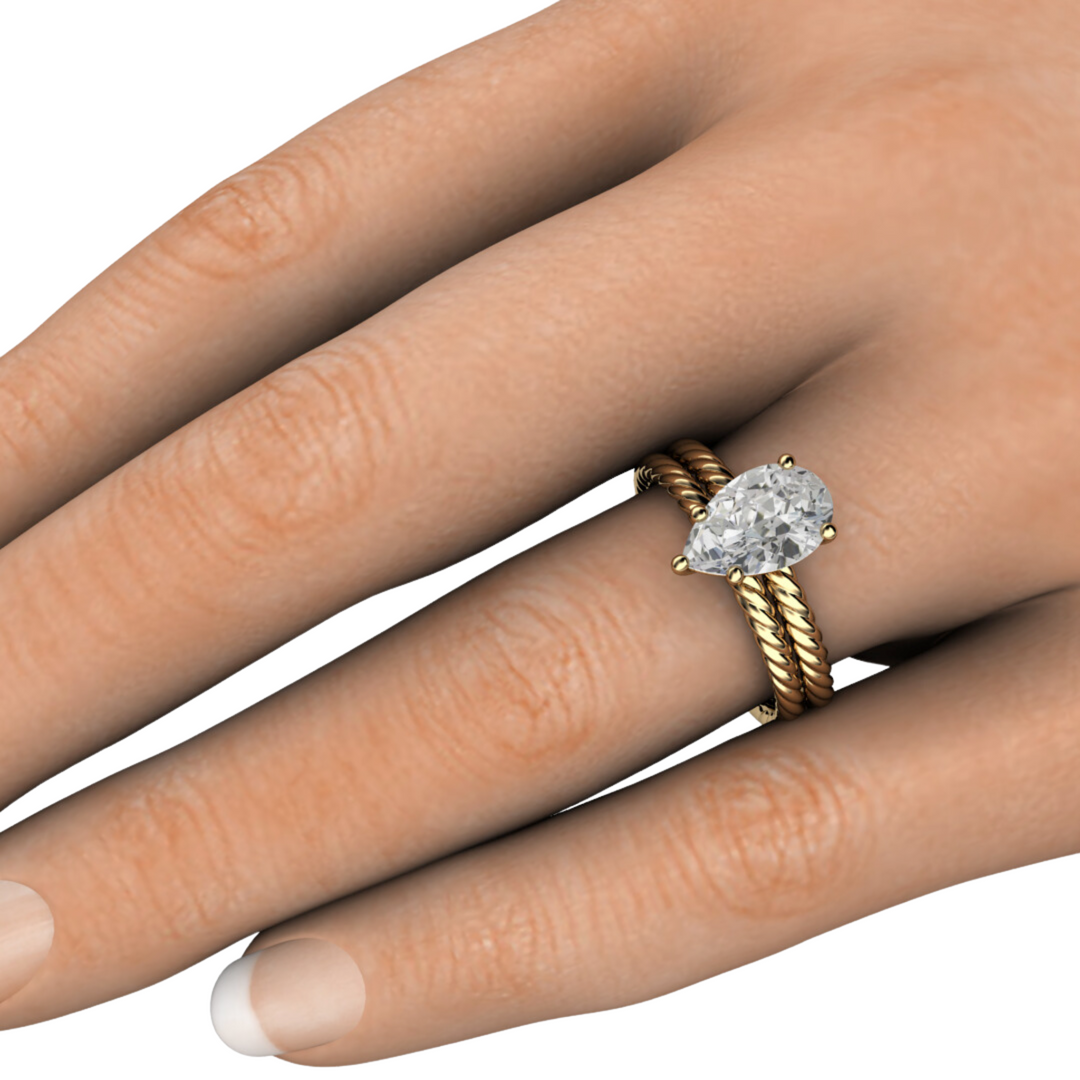 Lab-created pear diamond ring with eco-friendly materials, perfect for modern brides seeking sustainable luxury. 