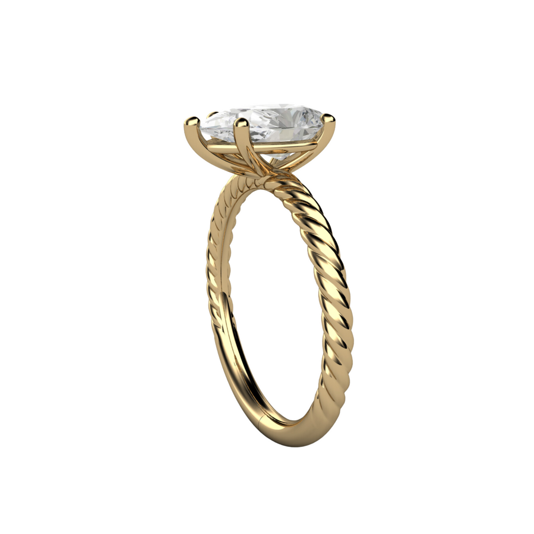 Lab Grown Pear Cut Diamond Engagement Ring showing the twisted rope-style band in Yellow Gold 