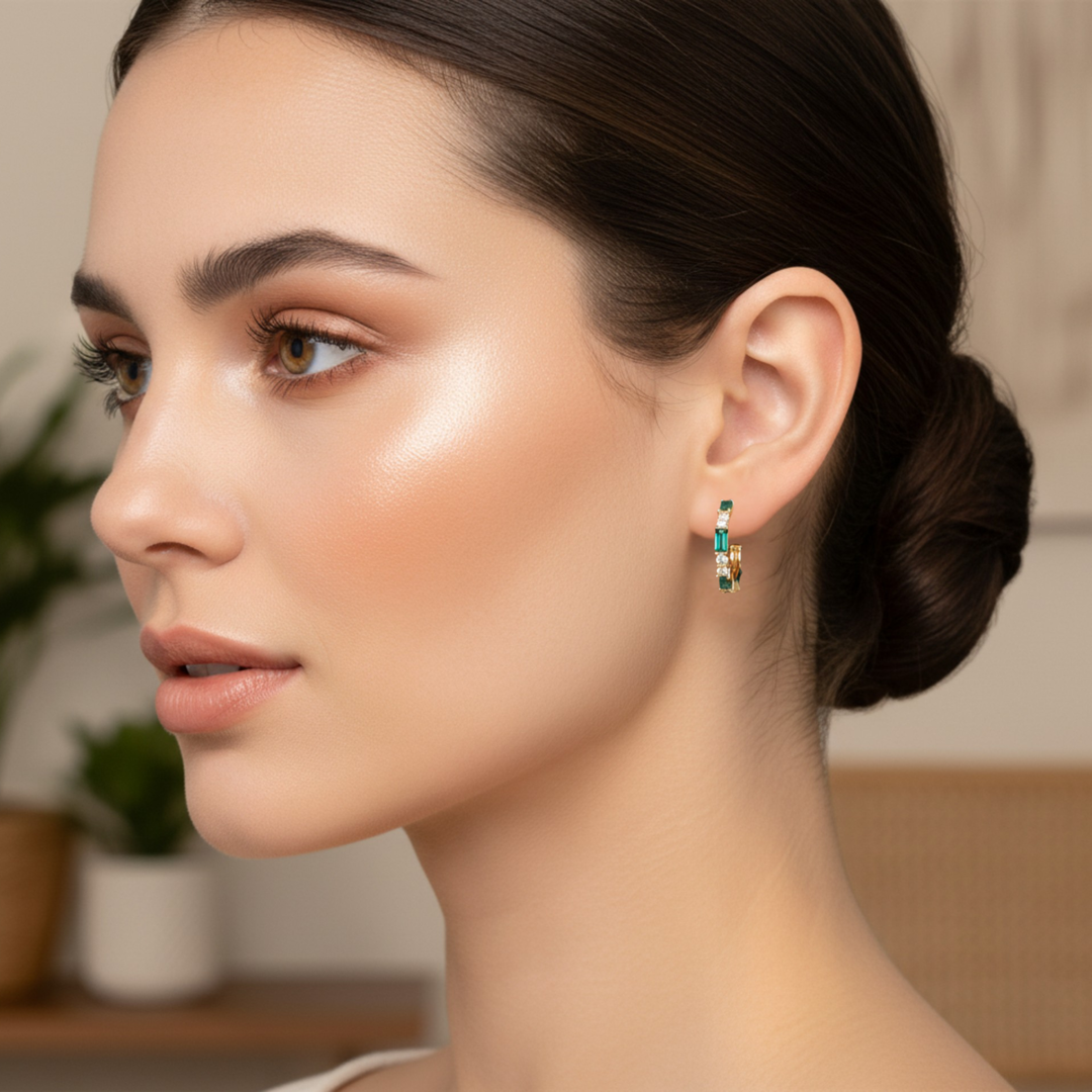 14K Gold Emerald Diamond Hoop Earrings shown on a the ear, May Birthstone Earrings, Hoops with Baguette Cut Diamonds | Rare Earth Jewelry