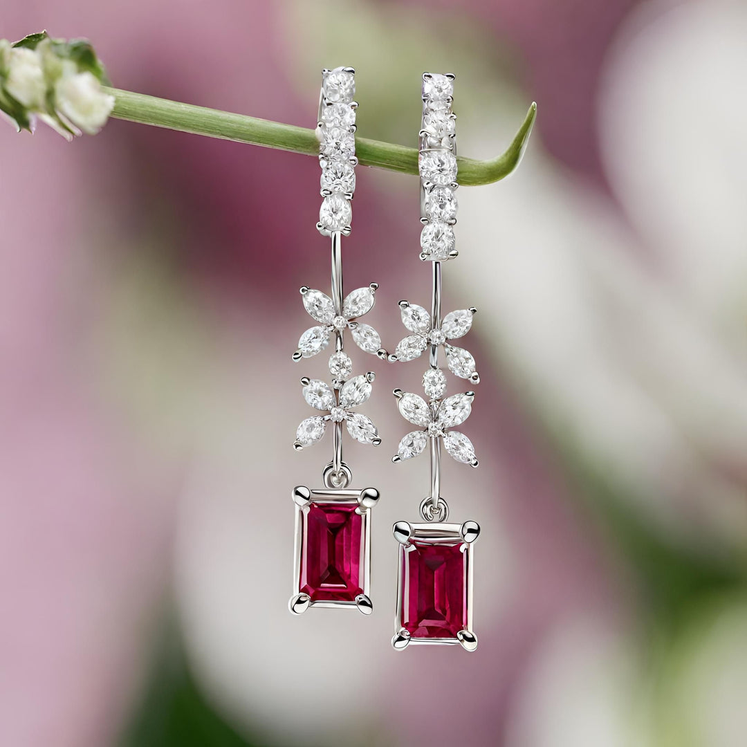 Emerald cut ruby dangle earrings with diamonds in 14K Gold from Rare Earth Jewelry.