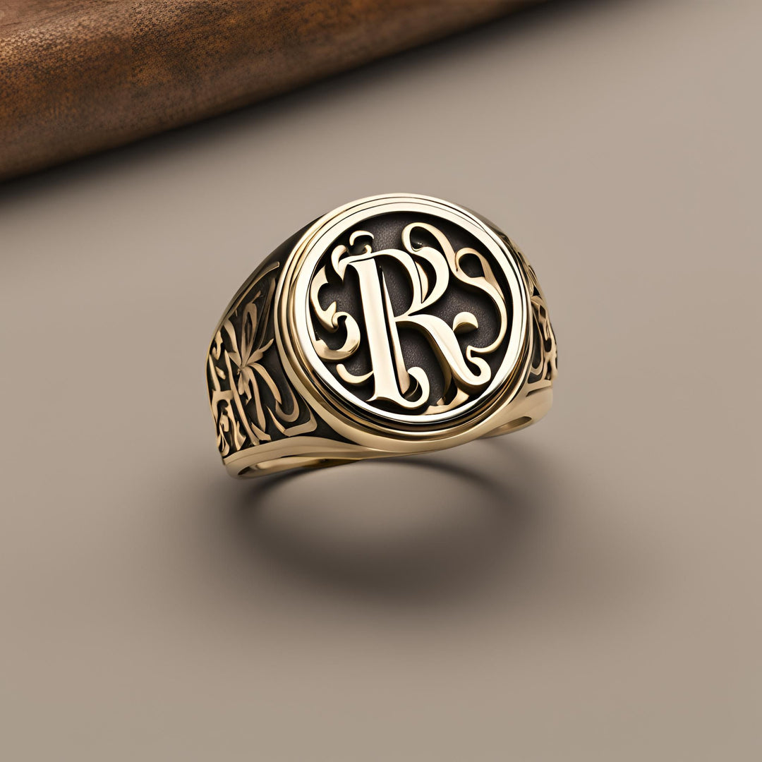 A 14K Gold round signet ring with initials, personalized pinky ring from Rare Earth Jewelry.