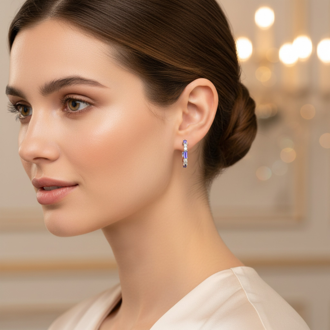 14K Natural Tanzanite and Diamond Hoop Earrings shown on a Model, Baguette Hoops with Alternating Tanzanite baguettes and round Diamonds, December Birthstone Earrings with light purple gemstones. | Rare Earth Jewelry