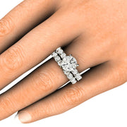 2 Carat Moissanite wedding set on the hand.  Ethical and eco-friendly bridal set.